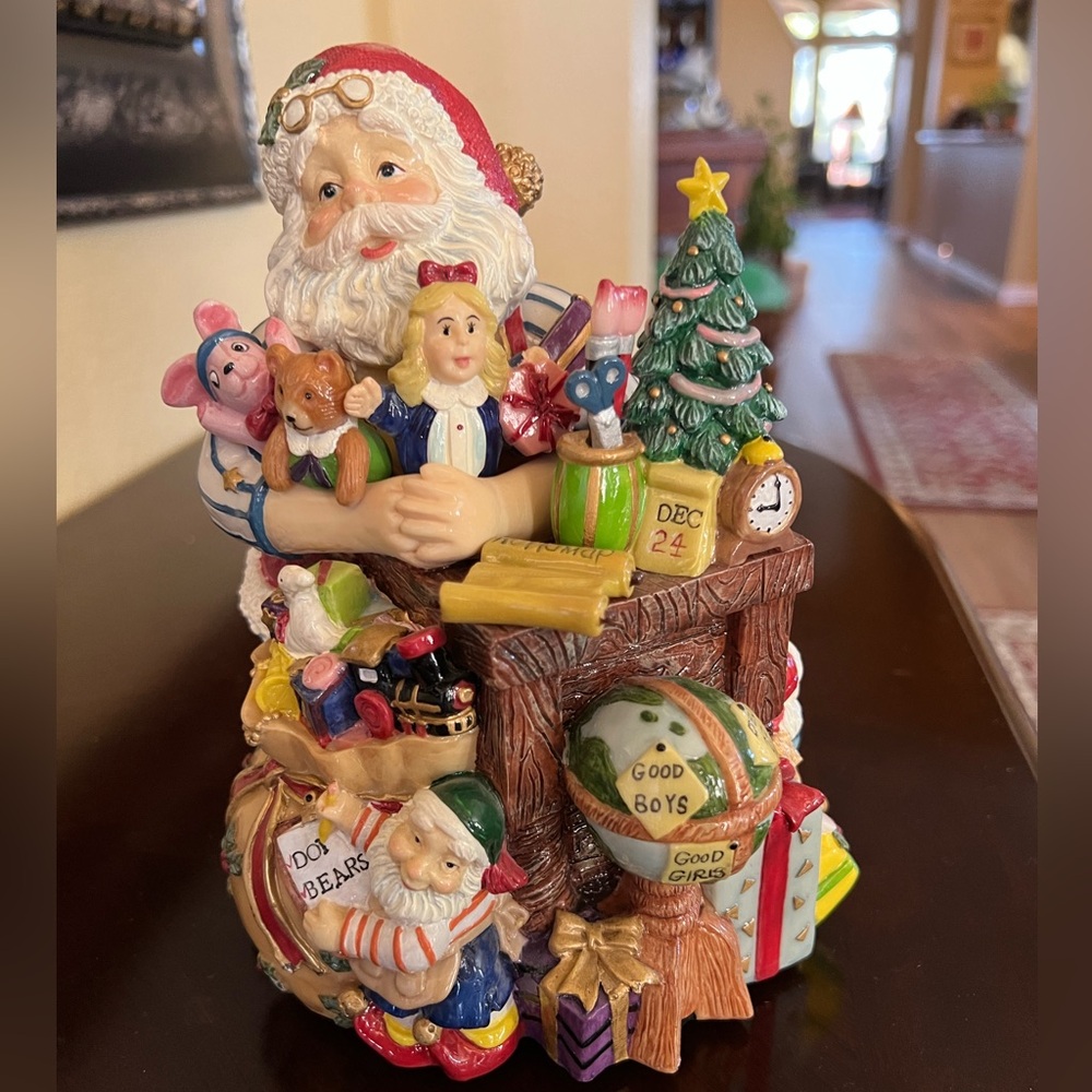 Fitz and Floyd Santa and toys musical resin figurine.